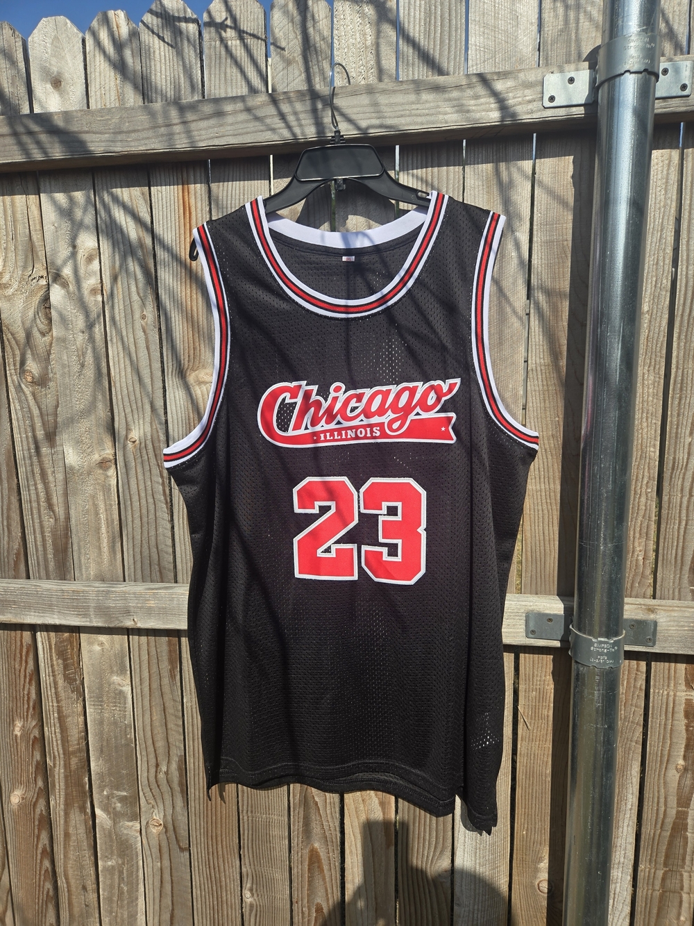 Black Chicago Basketball Jersey with Red and White Accents
